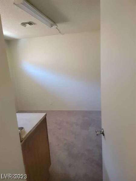 bathroom featuring vanity and visible vents