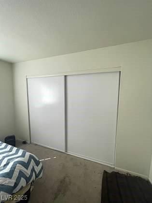 unfurnished bedroom with a closet