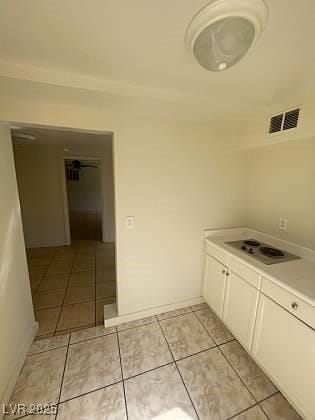 bathroom featuring visible vents and tile patterned floors