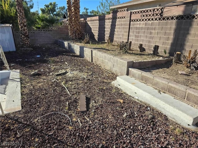 details with a fenced backyard