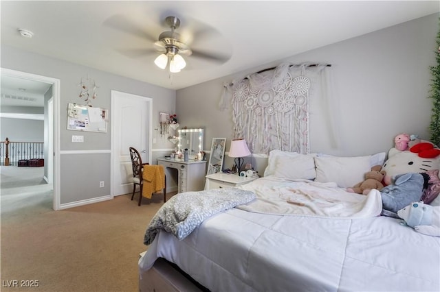 bedroom featuring a ceiling fan, light colored carpet, and visible vents