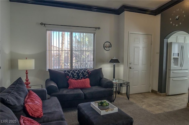 tiled living room featuring carpet floors, arched walkways, and crown molding