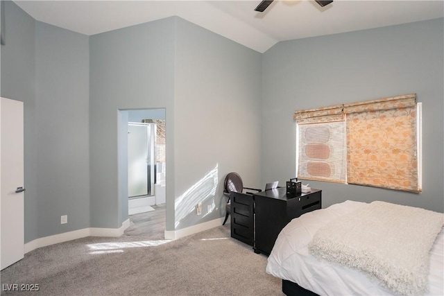 bedroom with carpet floors, baseboards, vaulted ceiling, and a ceiling fan