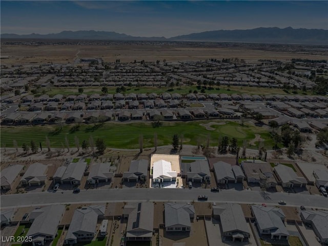 bird's eye view featuring a residential view and a mountain view