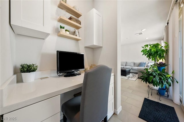 home office featuring visible vents and built in desk