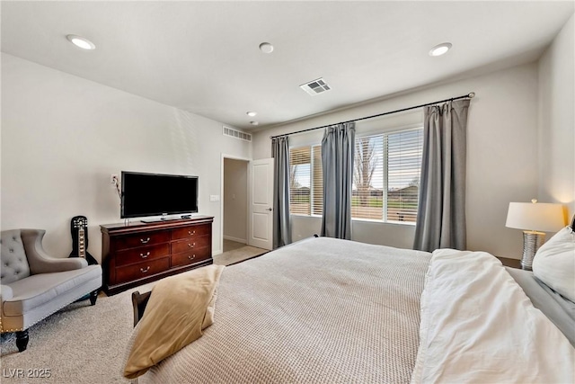 carpeted bedroom featuring visible vents and recessed lighting