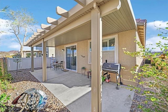 view of patio / terrace with fence and grilling area