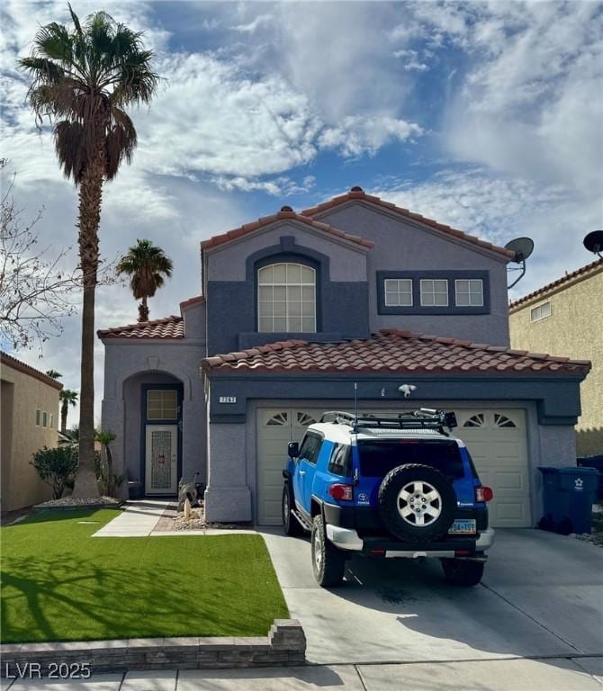 view of front of home with a garage, driveway, a tile roof, and stucco siding