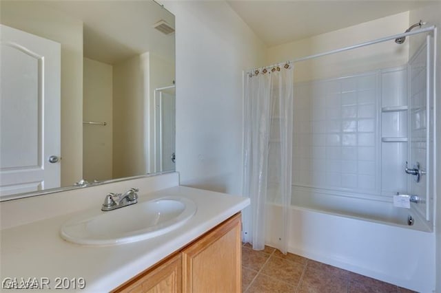 bathroom with tile patterned flooring, visible vents, shower / bath combination with curtain, and vanity