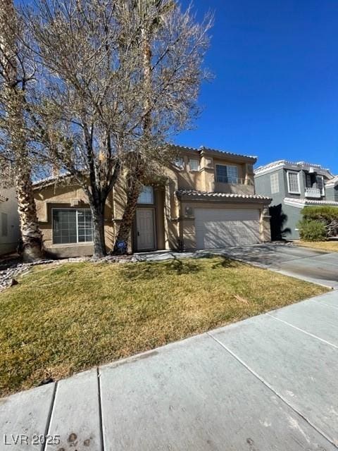 view of front facade featuring driveway, stucco siding, a tile roof, an attached garage, and a front yard