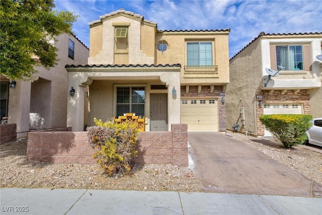 view of front of home featuring driveway, an attached garage, a tile roof, and stucco siding