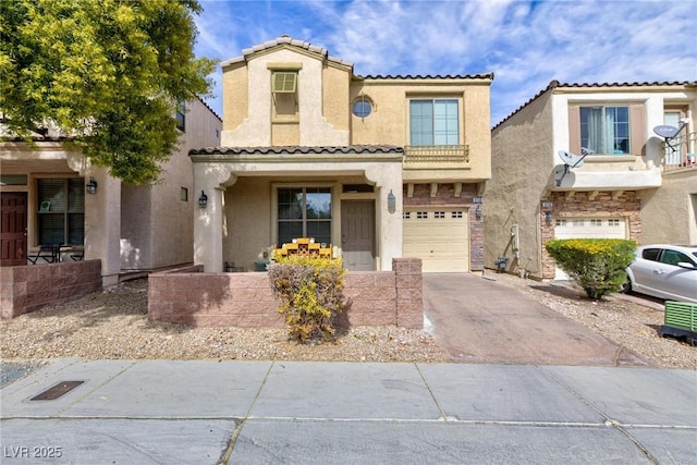 view of front facade with a garage, driveway, a tiled roof, and stucco siding