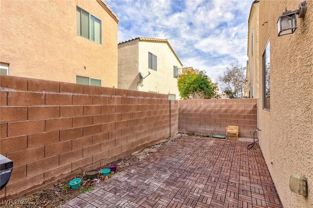 view of patio with a fenced backyard