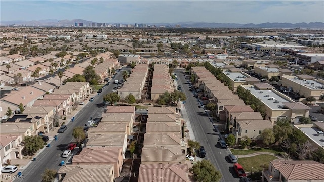 birds eye view of property featuring a mountain view and a residential view