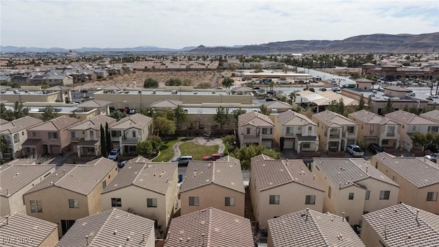 drone / aerial view with a residential view and a mountain view