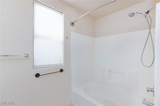 full bath with bathtub / shower combination and a healthy amount of sunlight