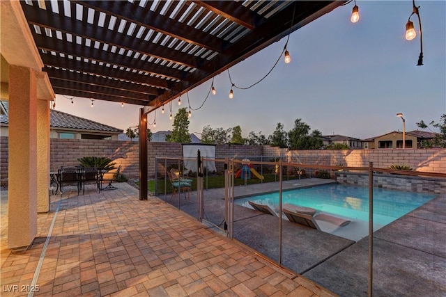 view of pool with a fenced in pool, a patio, a fenced backyard, a pergola, and outdoor dining space