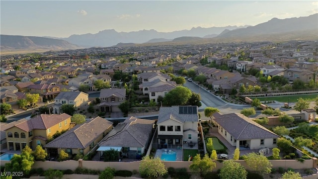 bird's eye view with a mountain view and a residential view