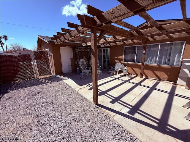 view of patio / terrace featuring a gate and a pergola