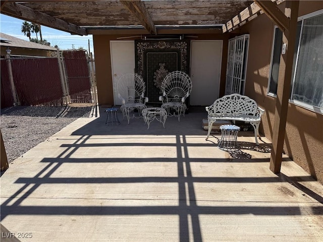 view of patio / terrace with fence