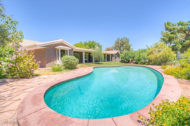 pool featuring a patio