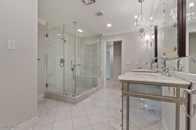 bathroom featuring ornamental molding, a stall shower, visible vents, and a sink