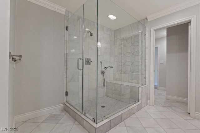 bathroom featuring baseboards, a stall shower, and crown molding