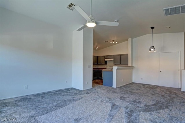 unfurnished living room featuring carpet flooring, visible vents, and a ceiling fan