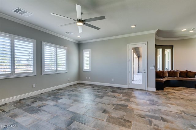 unfurnished room featuring crown molding, visible vents, and baseboards