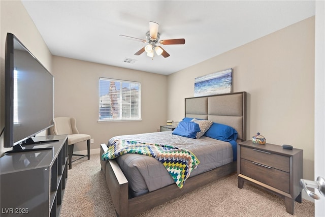 bedroom featuring visible vents, carpet floors, baseboards, and ceiling fan