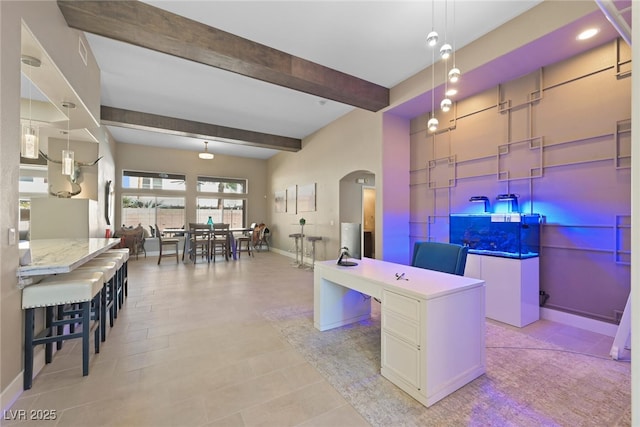 office featuring arched walkways, beamed ceiling, and baseboards