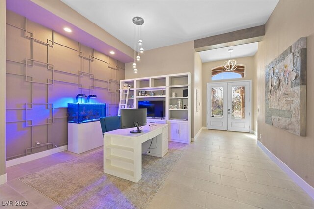 playroom featuring light tile patterned floors, a notable chandelier, french doors, and baseboards