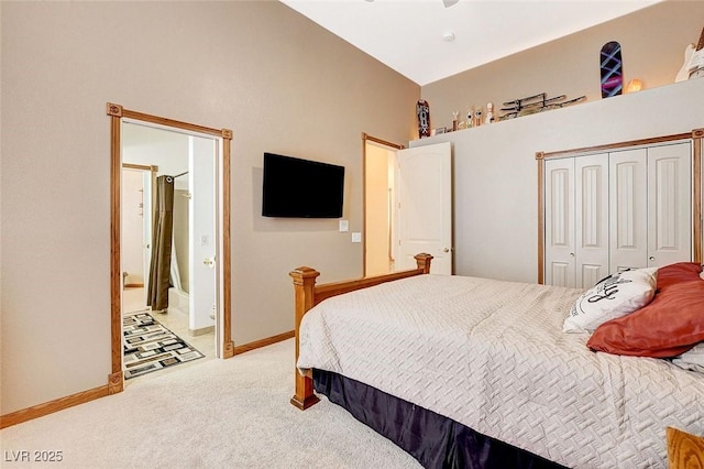 bedroom featuring ceiling fan, a high ceiling, carpet flooring, baseboards, and a closet