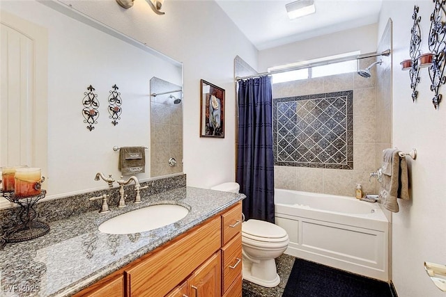 full bathroom with shower / tub combo, vanity, and toilet