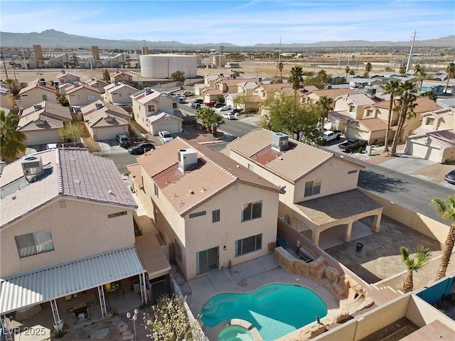 bird's eye view featuring a residential view and a mountain view