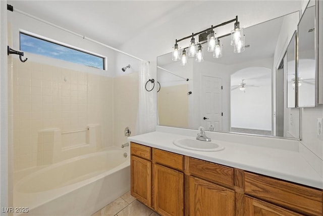 bathroom with shower / tub combo, vanity, and tile patterned floors