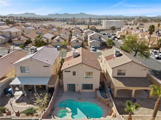 birds eye view of property featuring a residential view and a mountain view