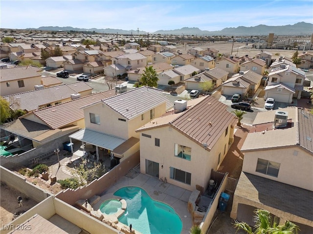 bird's eye view with a residential view and a mountain view