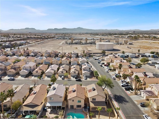 aerial view featuring a mountain view and a residential view