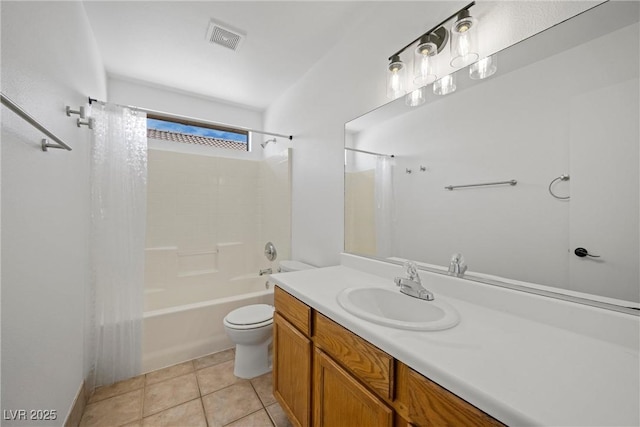 full bathroom featuring toilet, vanity, visible vents, tile patterned floors, and shower / bath combo with shower curtain