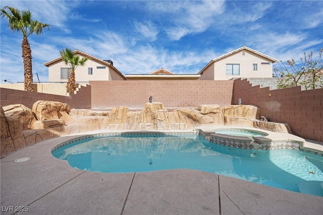 view of pool featuring an in ground hot tub, a fenced backyard, and a fenced in pool