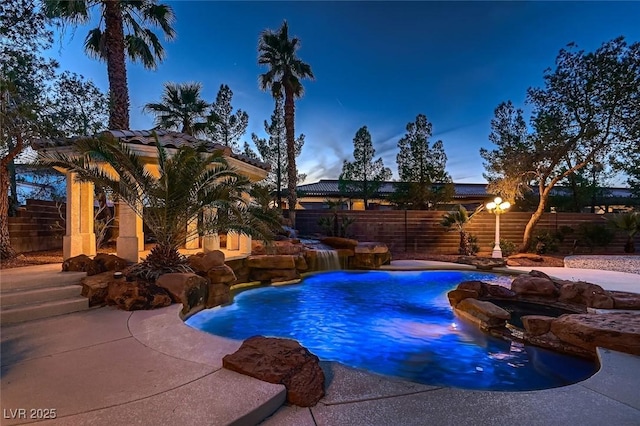 view of swimming pool with a patio, a fenced backyard, and a fenced in pool