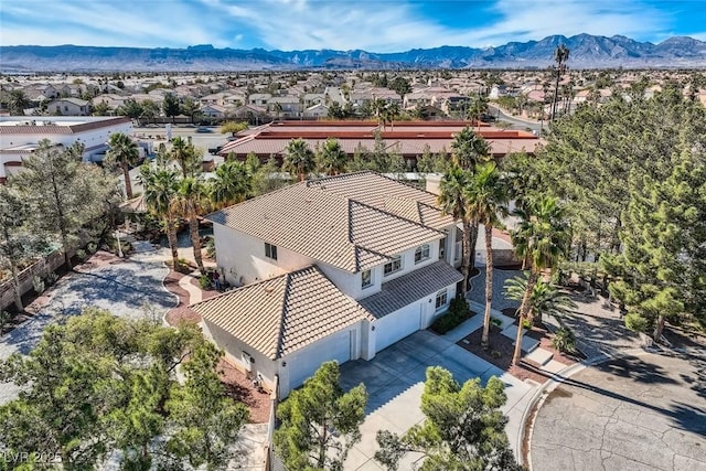 bird's eye view with a residential view and a mountain view