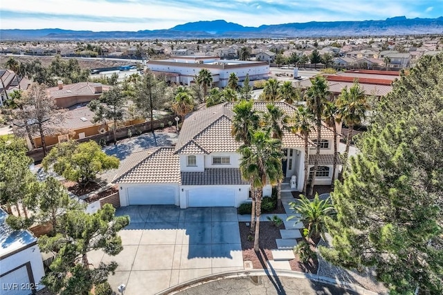 bird's eye view featuring a residential view and a mountain view