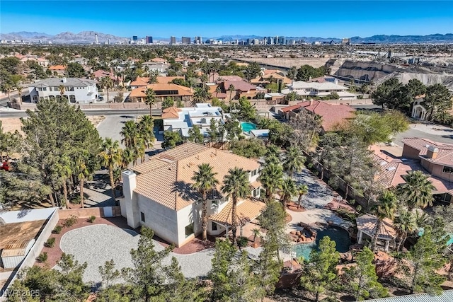 birds eye view of property featuring a residential view and a mountain view