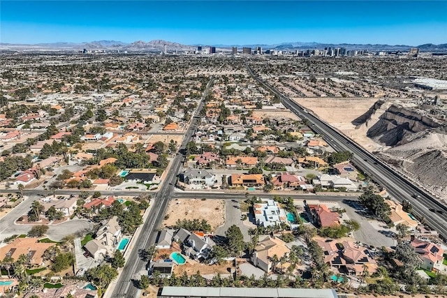 birds eye view of property with a residential view and a mountain view