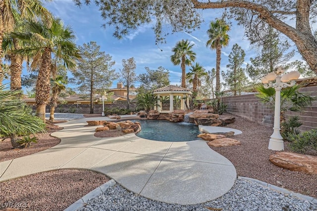 view of pool featuring a gazebo, a patio area, a fenced backyard, and a fenced in pool