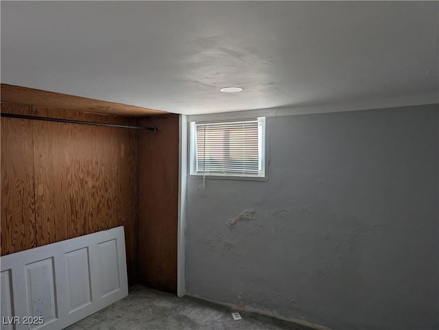 unfurnished bedroom with light colored carpet