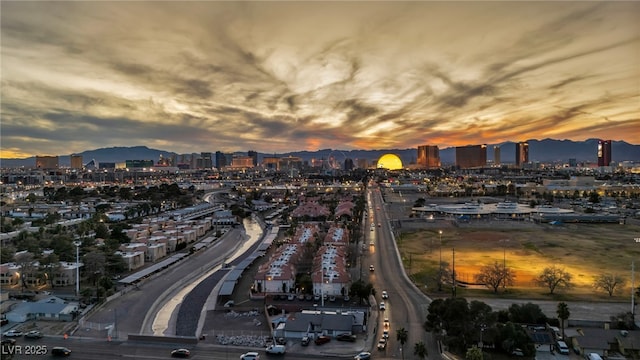 drone / aerial view with a view of city and a mountain view