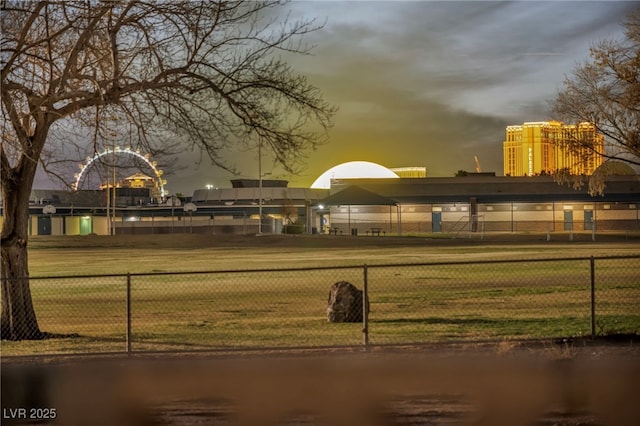 view of property's community with fence